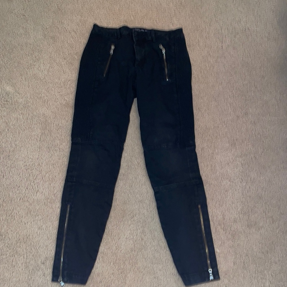 Black pants with zippers! Size 4 low waisted and stretchy fabric!